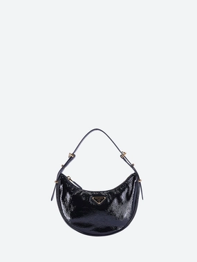 Leather arqu patent handbag