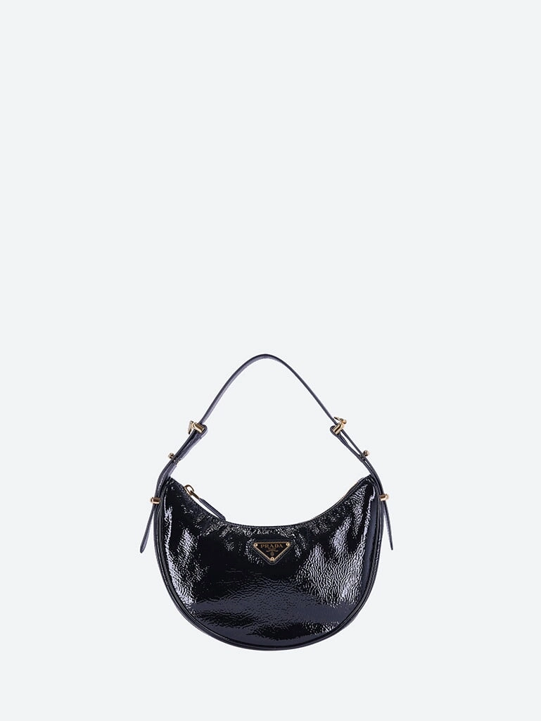 Leather arqu patent handbag