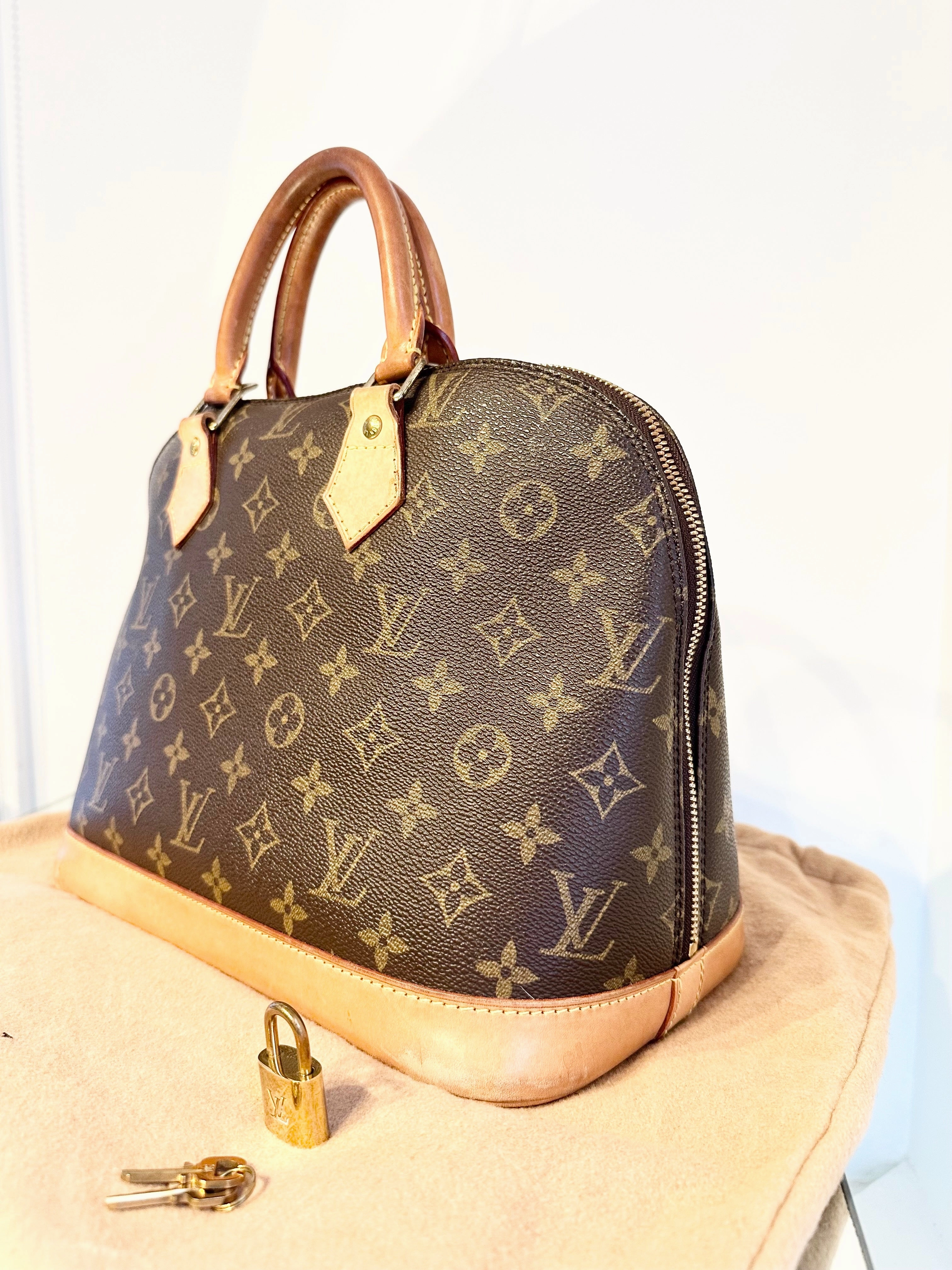 LOUIS VUITTON Monogram Alma PM Bag