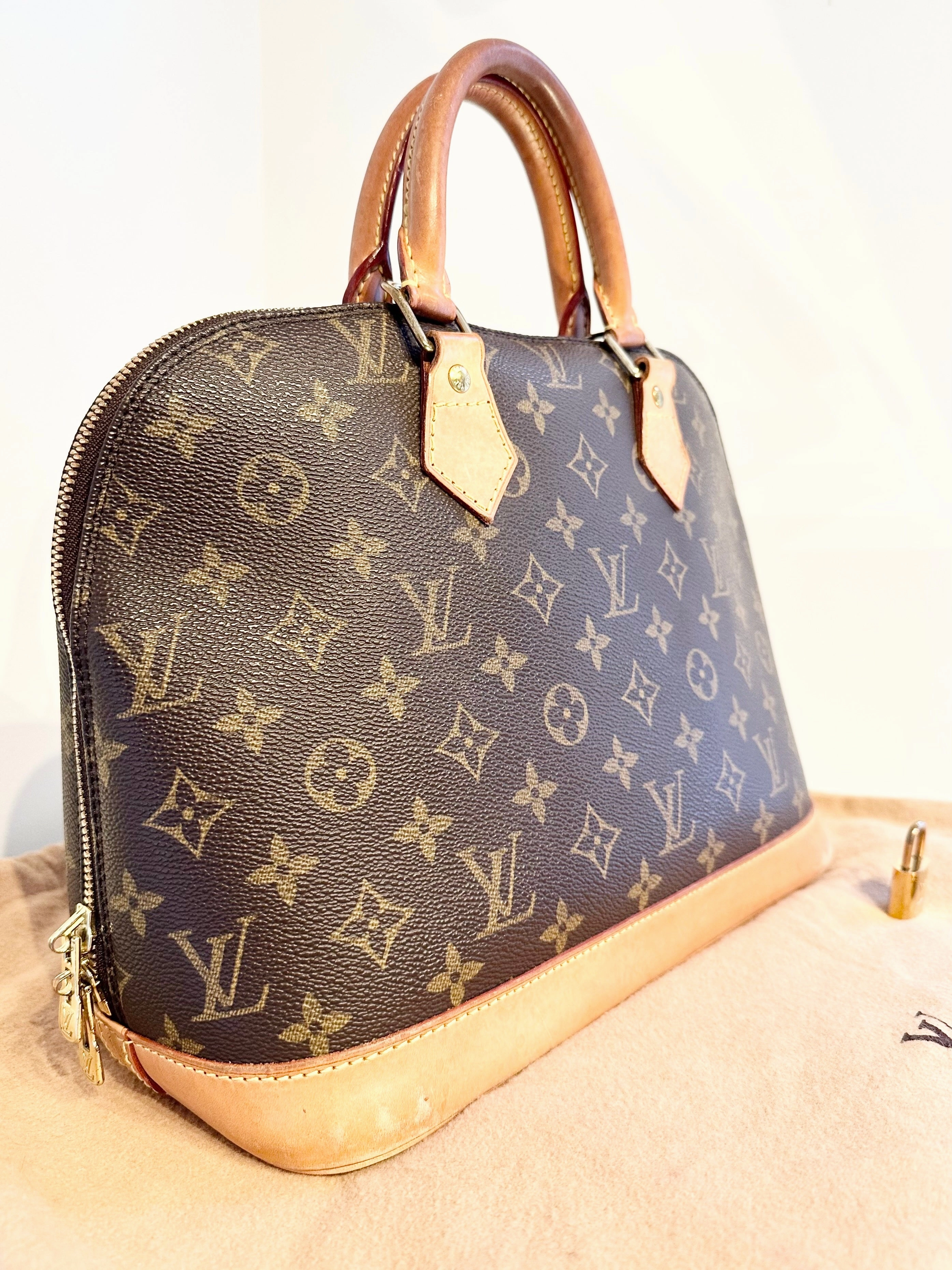 LOUIS VUITTON Monogram Alma PM Bag