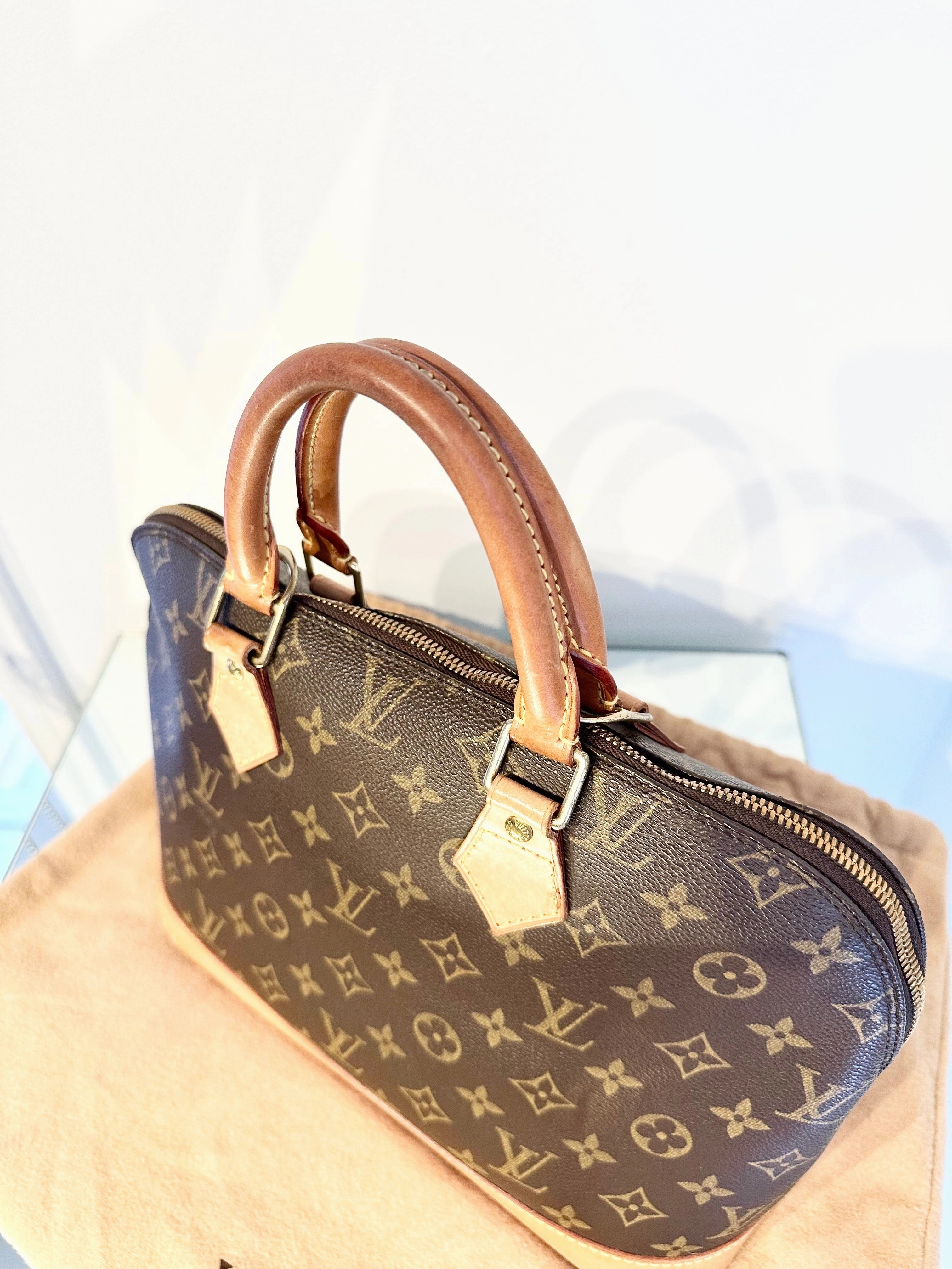 LOUIS VUITTON Monogram Alma PM Bag