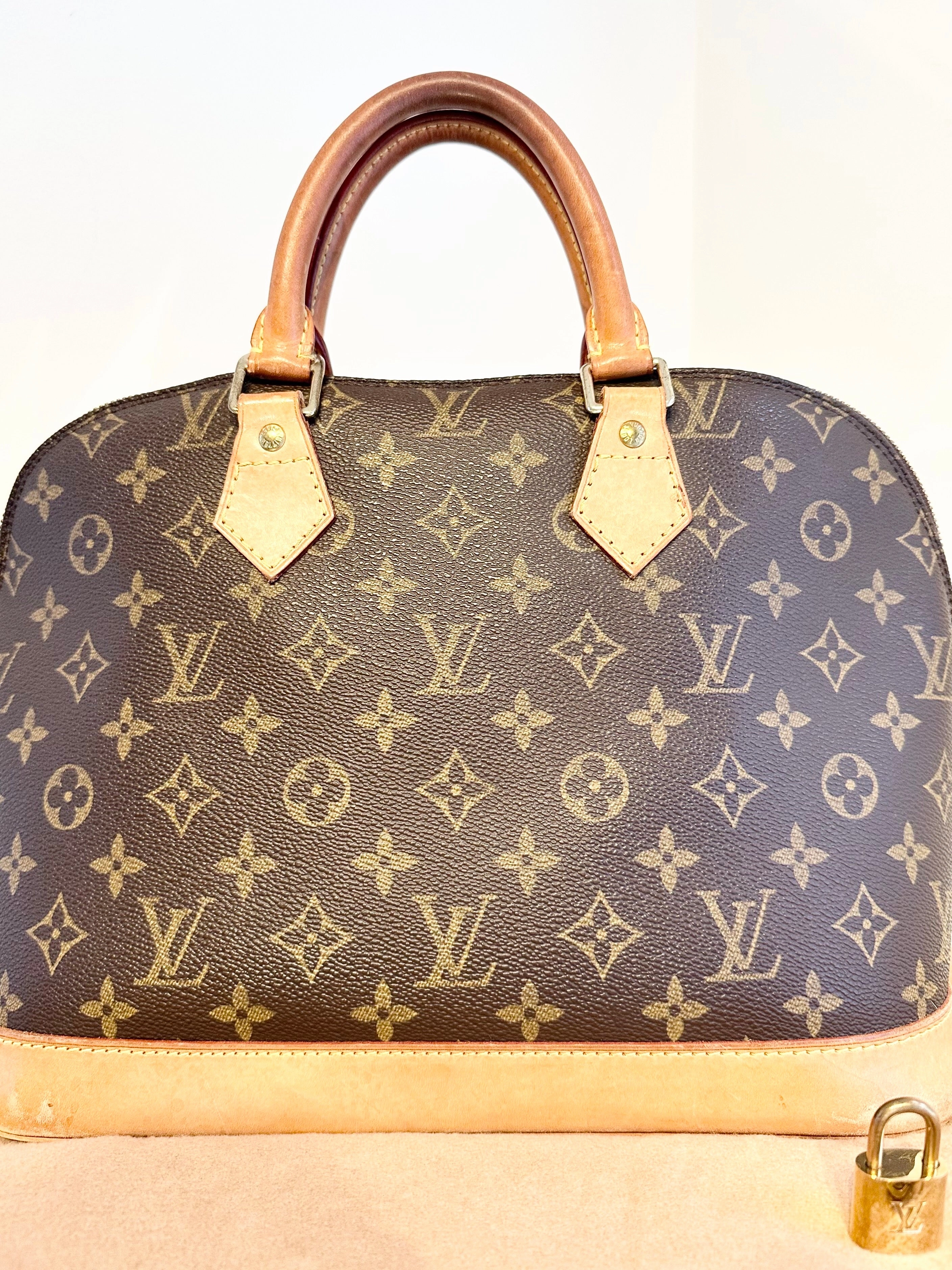 LOUIS VUITTON Monogram Alma PM Bag