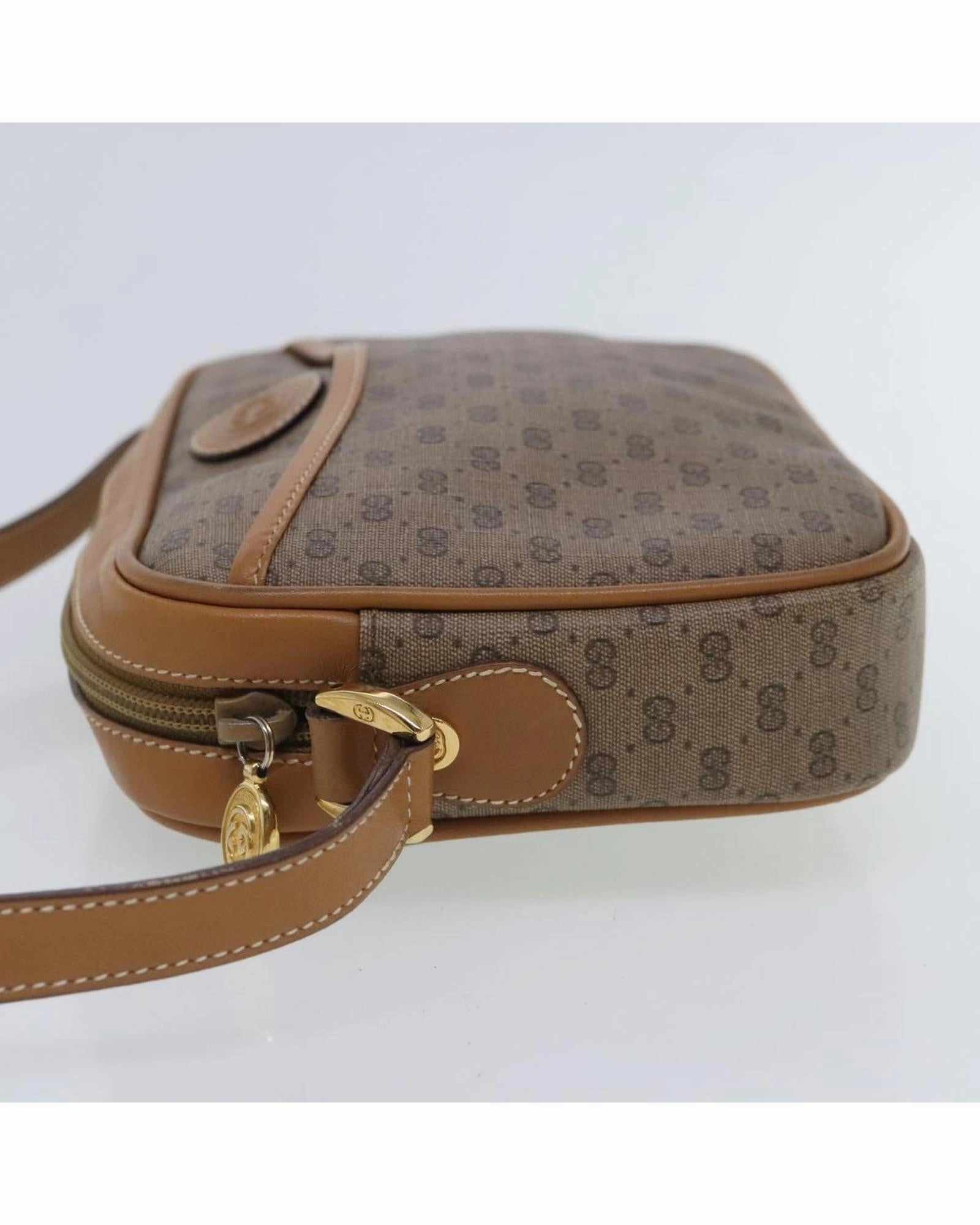 Micro GG Supreme Shoulder Bag in PVC with Gold Accents