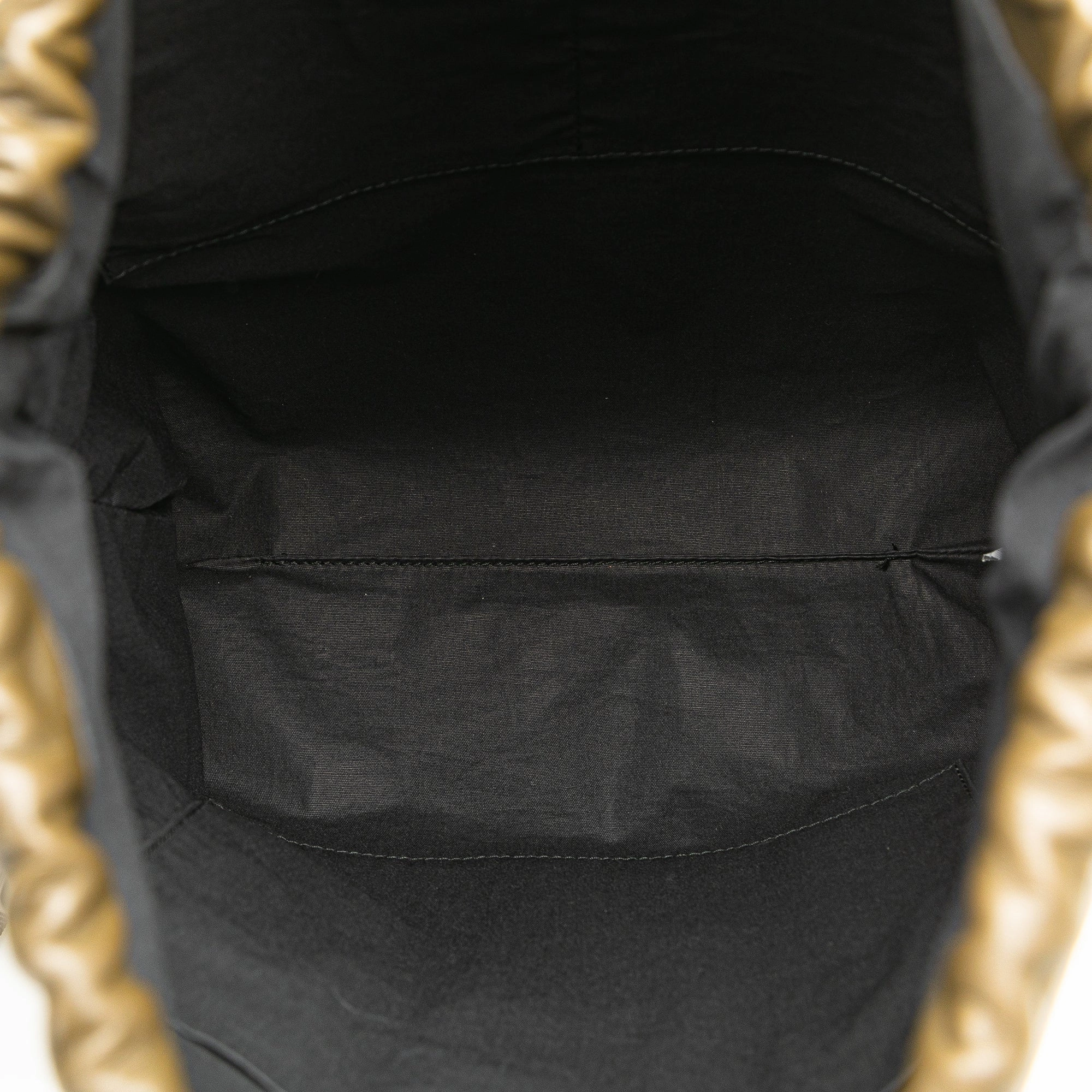 Perforated Leather Drawstring Backpack