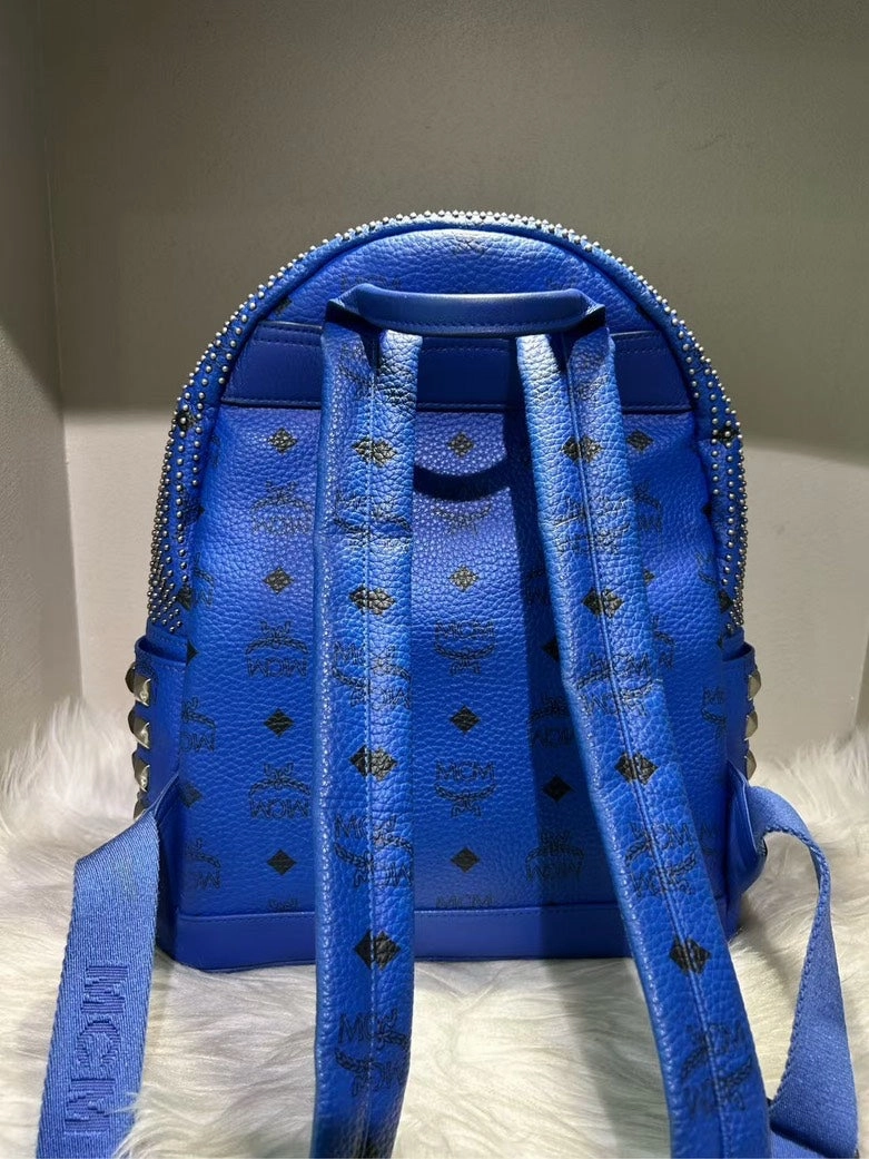 Pre-loved MCM Stark Studded Blue Leather Backpack