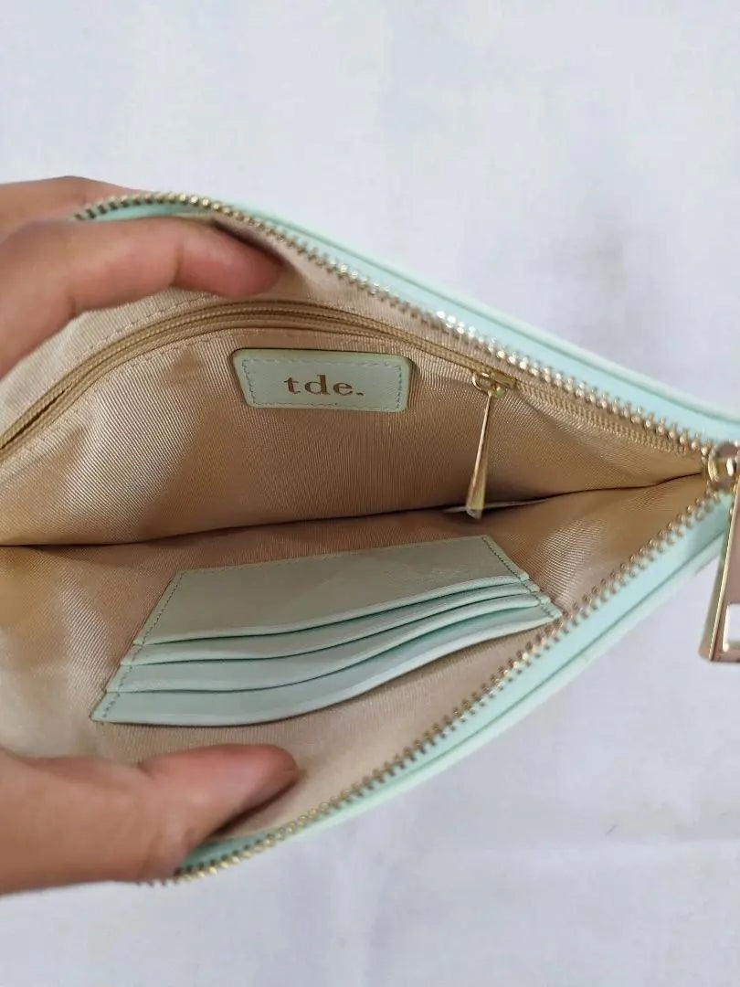 tde. Mint Woven Faux Leather Clutch Size None